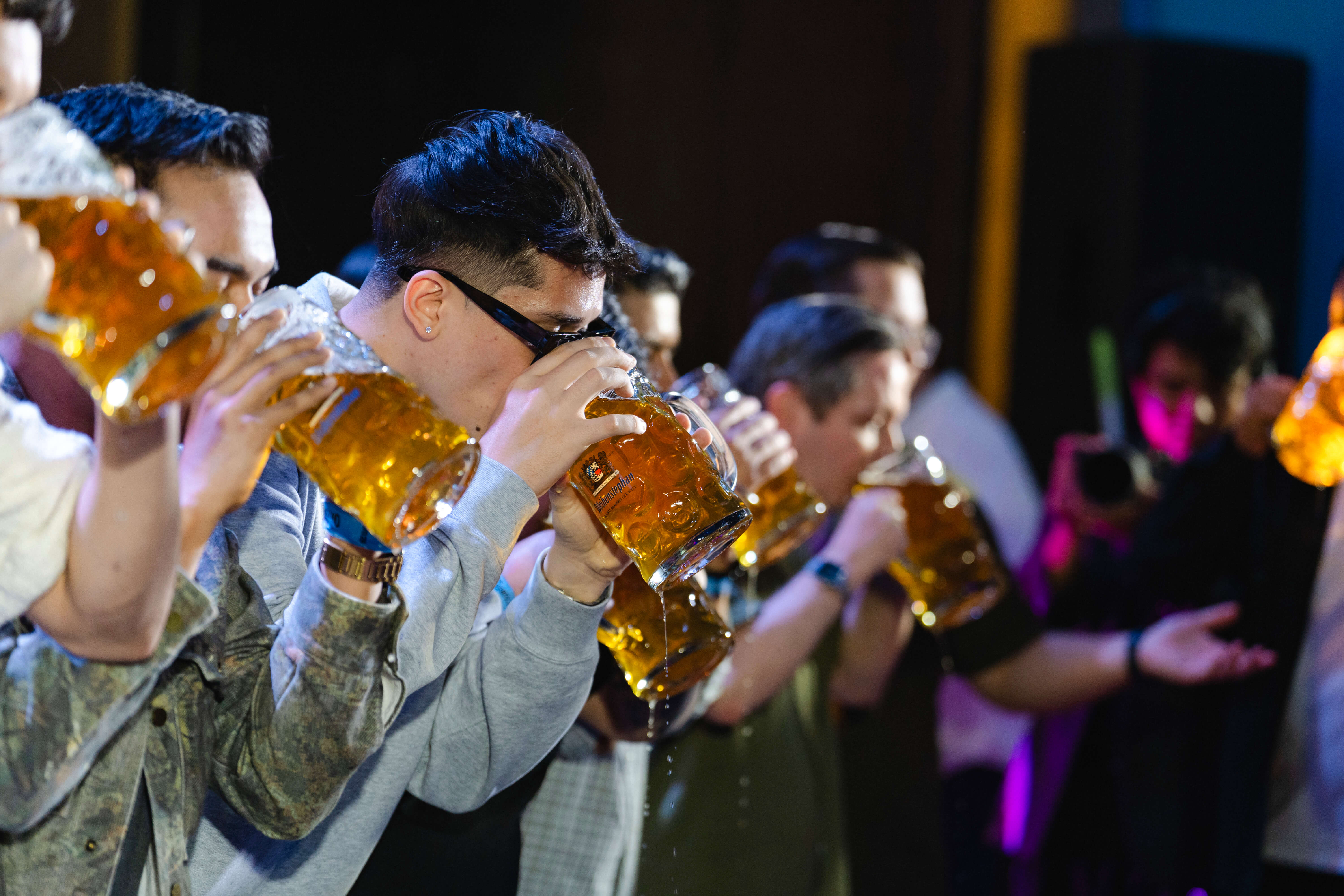 Guests take on the beer-chugging competition, bringing spirited fun to Oktoberfest at Newport World Resorts