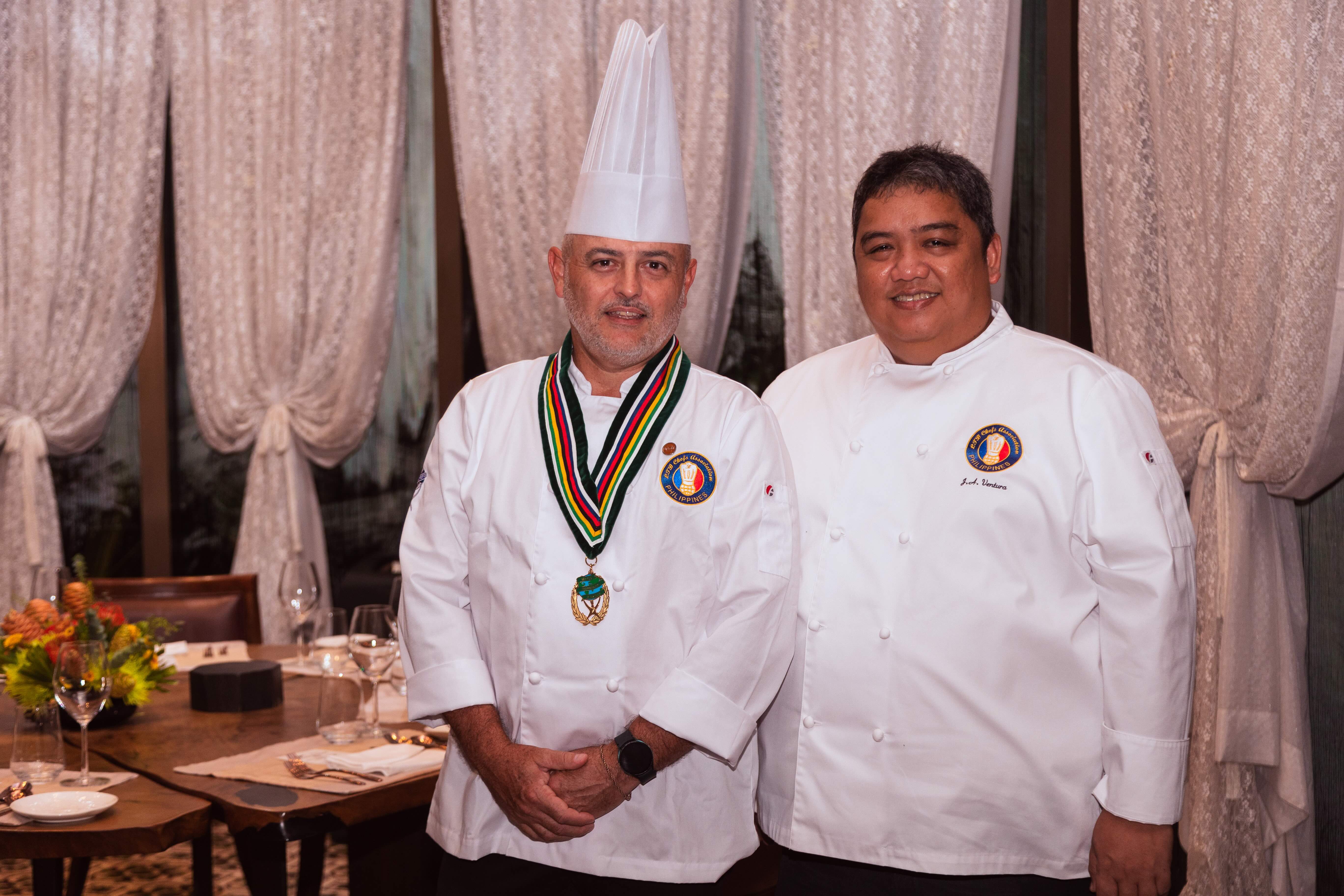 Newport World Resorts Director of Kitchen Operations Chef Neil Abrahams (left) receives recognition as an Honorary Life Membership of World Chef