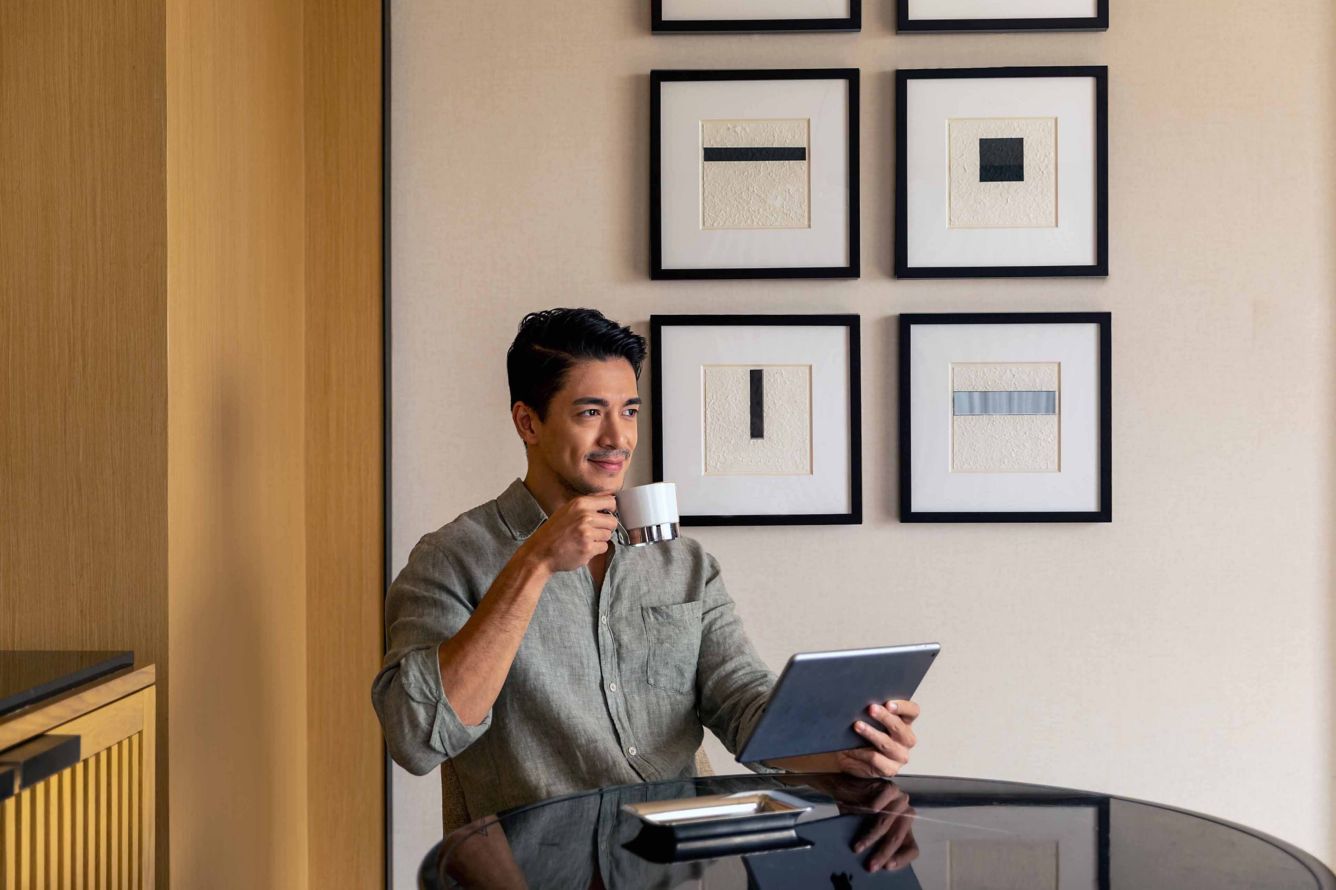 A man in a working space in Sheraton Manila