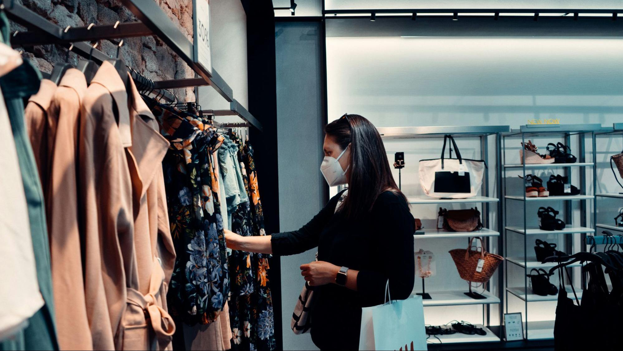 A woman checking for clothes in a store